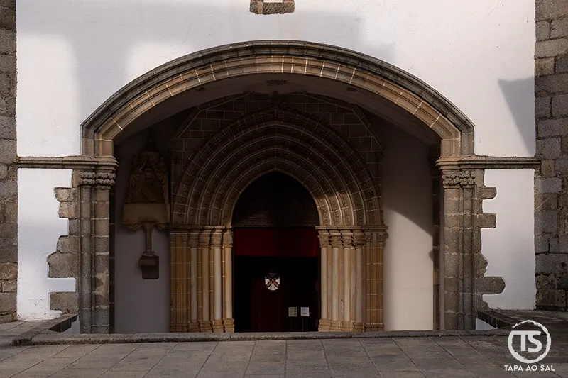 Gothic portal of the Church of Lóios in Évora with finely carved stone arch